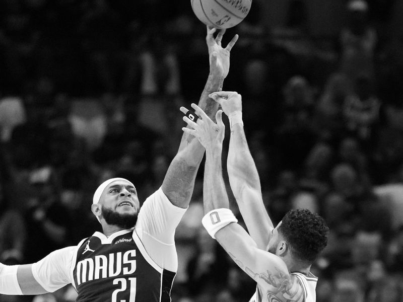 DALLAS, TX - JUNE 14: (EDITORS NOTE: this photo has been converted to black and white)Daniel Gafford #21 of the Dallas Mavericks blocks the shot during the game against the Boston Celtics during Game 4 of the 2024 NBA Finals on June 14, 2024 at the American Airlines Center in Dallas, Texas. NOTE TO USER: User expressly acknowledges and agrees that, by downloading and or using this photograph, User is consenting to the terms and conditions of the Getty Images License Agreement. Mandatory Copyright Notice: Copyright 2024 NBAE (Photo by Jesse D. Garrabrant/NBAE via Getty Images)