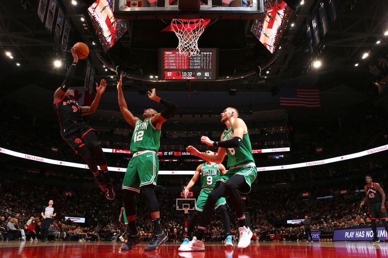 TORONTO, CANADA - JANUARY 15:  RJ Barrett #9 of the Toronto Raptors drives to the basket during the game against the Boston Celtics on January 15, 2024 at the Scotiabank Arena in Toronto, Ontario, Canada.  NOTE TO USER: User expressly acknowledges and agrees that, by downloading and or using this Photograph, user is consenting to the terms and conditions of the Getty Images License Agreement.  Mandatory Copyright Notice: Copyright 2024 NBAE (Photo by Vaughn Ridley/NBAE via Getty Images)