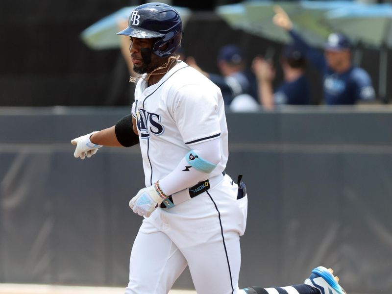 May 1, 2025; St. Petersburg, Florida, USA;  Tampa Bay Rays designated hitter Yandy Diaz (2) runs around the bases after he hit a home run during the first inning against the Kansas City Royals at George M. Steinbrenner Field. Mandatory Credit: Kim Klement Neitzel-Imagn Images