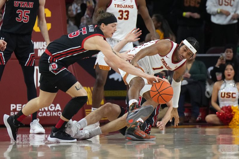 Jan 14, 2023; Los Angeles, California, USA; Southern California Trojans guard Malik Thomas (1) and Utah Utes guard Gabe Madsen (55) battle for the ball in the first half at Galen Center. Mandatory Credit: Kirby Lee-USA TODAY Sports