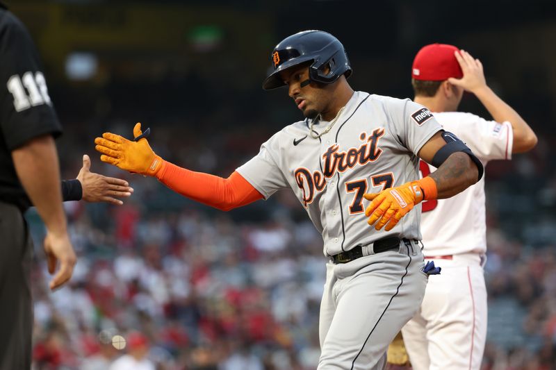 Sep 16, 2023; Anaheim, California, USA;  Detroit Tigers left fielder Andy Ibanez (77) reacts after hitting a single during the first inning against the Los Angeles Angels at Angel Stadium. Mandatory Credit: Kiyoshi Mio-USA TODAY Sports