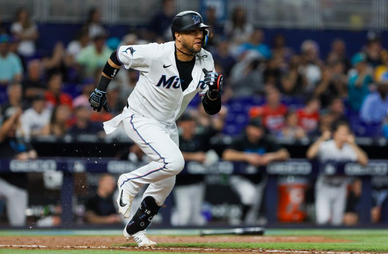 Jun 25, 2023; Miami, Florida, USA; Miami Marlins first baseman Yuli Gurriel (10) runs toward first base after hitting an RBI single against the Pittsburgh Pirates during the eighth inning at loanDepot Park. Mandatory Credit: Sam Navarro-USA TODAY Sports