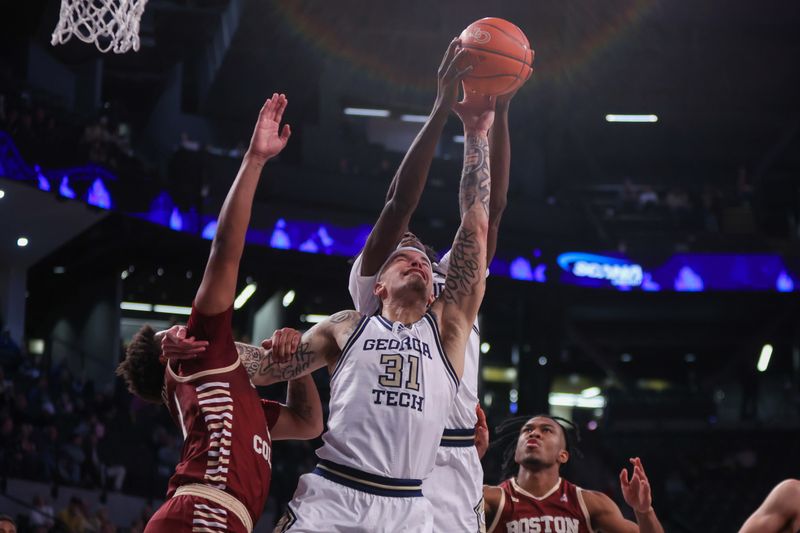 Jan 4, 2025; Atlanta, Georgia, USA; Georgia Tech Yellow Jackets forward Duncan Powell (31) reaches for a rebound against the Boston College Eagles in the first half at McCamish Pavilion. Mandatory Credit: Brett Davis-Imagn Images