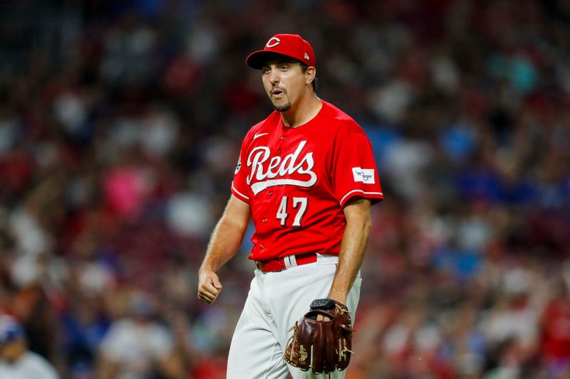 Aug 19, 2023; Cincinnati, Ohio, USA; Cincinnati Reds relief pitcher Derek Law (47) reacts after a play against the Toronto Blue Jays in the ninth inning at Great American Ball Park. Mandatory Credit: Katie Stratman-USA TODAY Sports