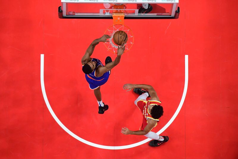 ATLANTA, GA - November 6:  Mikal Bridges #25 of the New York Knicks dunks the ball during the game against the Atlanta Hawks on November 6, 2024 at State Farm Arena in Atlanta, Georgia.  NOTE TO USER: User expressly acknowledges and agrees that, by downloading and/or using this Photograph, user is consenting to the terms and conditions of the Getty Images License Agreement. Mandatory Copyright Notice: Copyright 2024 NBAE (Photo by Adam Hagy/NBAE via Getty Images)