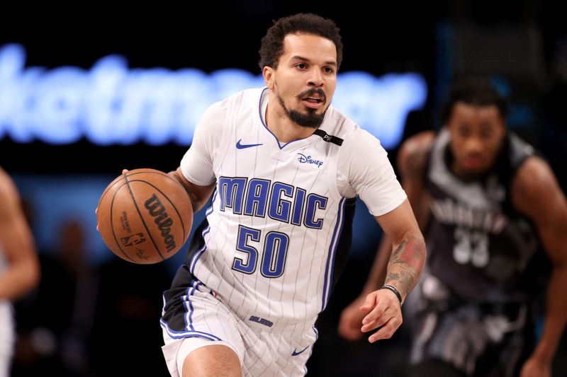 NEW YORK, NEW YORK - DECEMBER 01: Cole Anthony #50 of the Orlando Magic dribbles the ball against the Brooklyn Nets during the second half at Barclays Center on December 01, 2024 in New York City. NOTE TO USER: User expressly acknowledges and agrees that, by downloading and or using this photograph, User is consenting to the terms and conditions of the Getty Images License Agreement. (Photo by Evan Bernstein/Getty Images)