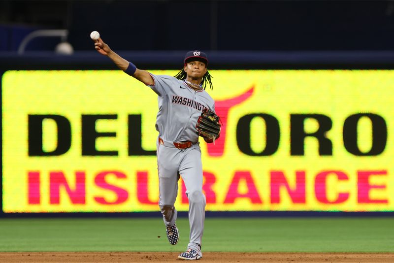 Apr 29, 2024; Miami, Florida, USA; Washington Nationals shortstop CJ Abrams (5) throws to first base to retire Miami Marlins outfielder Dane Myers (not pictured) during the fifth inning at loanDepot Park. Mandatory Credit: Sam Navarro-USA TODAY Sports