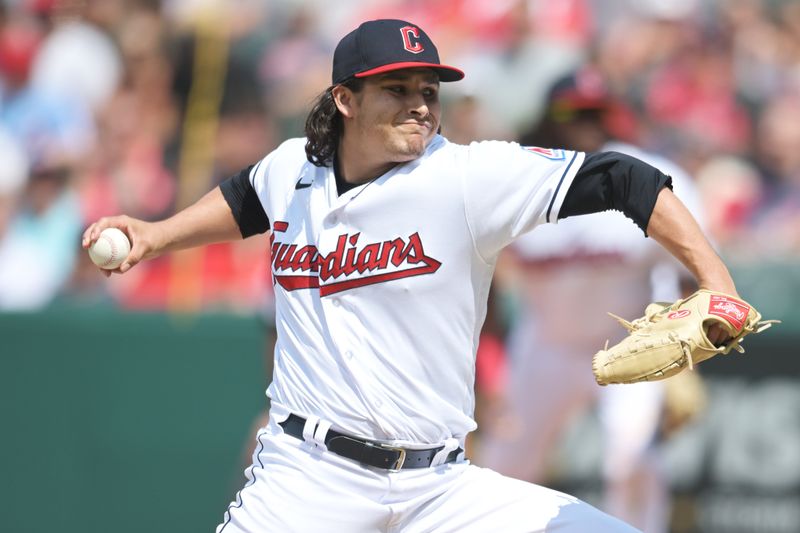 Jul 23, 2023; Cleveland, Ohio, USA; Cleveland Guardians relief pitcher Eli Morgan (49) throws a pitch during the seventh inning against the Philadelphia Phillies at Progressive Field. Mandatory Credit: Ken Blaze-USA TODAY Sports