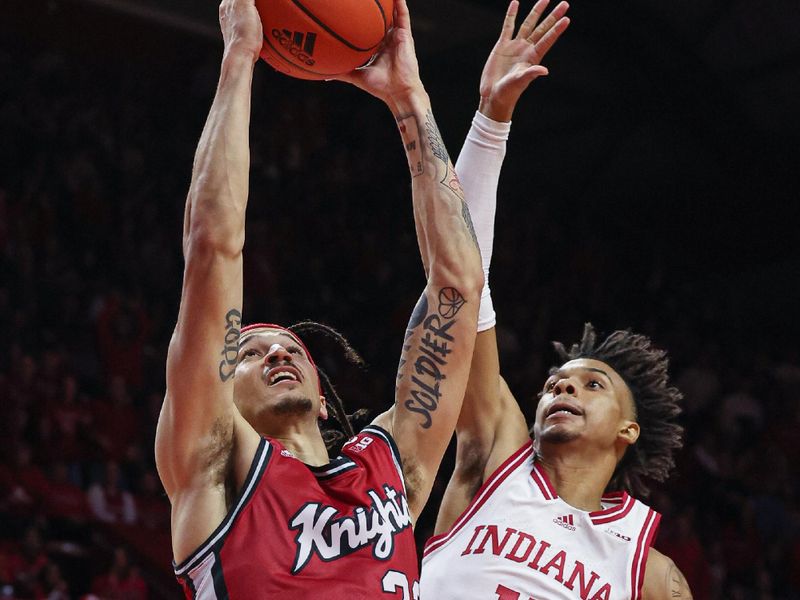 Dec 3, 2022; Piscataway, New Jersey, USA; Rutgers Scarlet Knights guard Caleb McConnell (22) goes up for a dunk against Indiana Hoosiers guard CJ Gunn (11) during the second half at Jersey Mike's Arena. Mandatory Credit: Vincent Carchietta-USA TODAY Sports