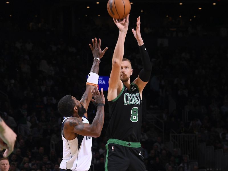 BOSTON, MA - MARCH 1: Kristaps Porzingis #8 of the Boston Celtics shoots the ball during the game against the Dallas Mavericks on March 1, 2024 at the TD Garden in Boston, Massachusetts. NOTE TO USER: User expressly acknowledges and agrees that, by downloading and or using this photograph, User is consenting to the terms and conditions of the Getty Images License Agreement. Mandatory Copyright Notice: Copyright 2024 NBAE  (Photo by Brian Babineau/NBAE via Getty Images)