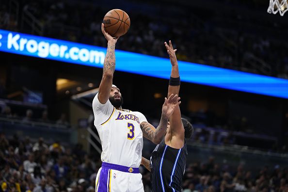 ORLANDO, FLORIDA - NOVEMBER 04: Anthony Davis #3 of the Los Angeles Lakers shoots against the Orlando Magic during the first half at Amway Center on November 04, 2023 in Orlando, Florida. NOTE TO USER: User expressly acknowledges and agrees that, by downloading and or using this photograph, User is consenting to the terms and conditions of the Getty Images License Agreement. (Photo by Rich Storry/Getty Images)