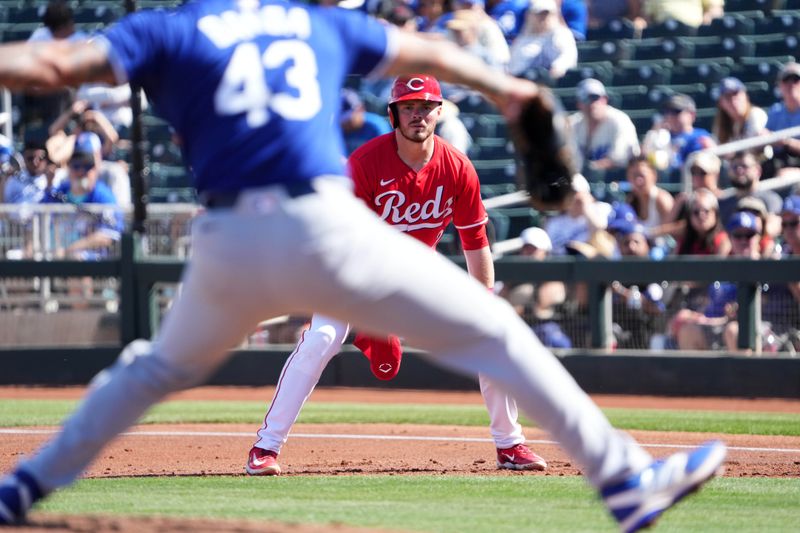 Feb 24, 2025; Goodyear, Arizona, USA; Cincinnati Reds second base Gavin Lux (2) leads off first base as Los Angeles Dodgers pitcher Anthony Banda (43) pitches during the second inning at Goodyear Ballpark. Mandatory Credit: Joe Camporeale-Imagn Images