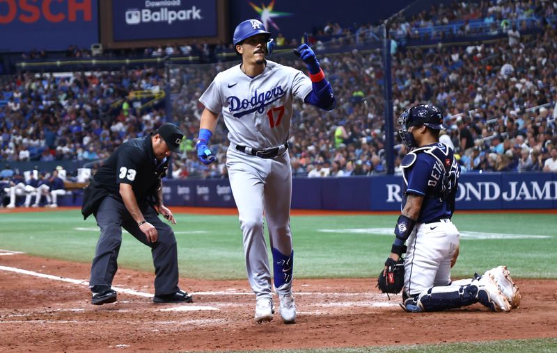 May 27, 2023; St. Petersburg, Florida, USA;  Los Angeles Dodgers second baseman Miguel Vargas (17) celebrates after hitting a home run during the eighth inning against the Tampa Bay Rays at Tropicana Field. Mandatory Credit: Kim Klement-USA TODAY Sports