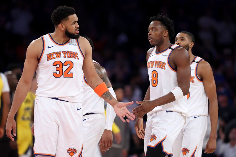 NEW YORK, NEW YORK - MAY 21:  Karl-Anthony Towns #32 and OG Anunoby #8 of the New York Knicks celebrate against the Indiana Pacers during the second quarter in Game One of the Eastern Conference Finals of the 2025 NBA Playoffs at Madison Square Garden on May 21, 2025 in New York City. NOTE TO USER: User expressly acknowledges and agrees that, by downloading and or using this photograph, User is consenting to the terms and conditions of the Getty Images License Agreement. (Photo by Sarah Stier/Getty Images)