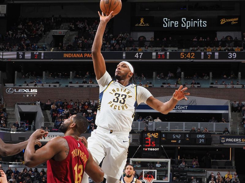 INDIANAPOLIS, IN - MARCH 18:  Myles Turner #33 of the Indiana Pacers goes to the basket during the game on March 18, 2024 at Gainbridge Fieldhouse in Indianapolis, Indiana. NOTE TO USER: User expressly acknowledges and agrees that, by downloading and or using this Photograph, user is consenting to the terms and conditions of the Getty Images License Agreement. Mandatory Copyright Notice: Copyright 2024 NBAE (Photo by Ron Hoskins/NBAE via Getty Images)