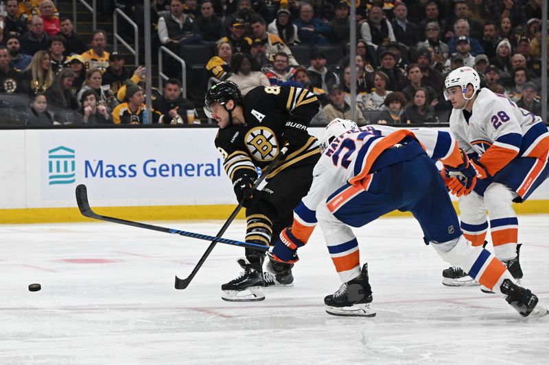 Nov 9, 2023; Boston, Massachusetts, USA; Boston Bruins right wing David Pastrnak (88) takes a shot in front of New York Islanders defenseman Scott Mayfield (24) during the third period at the TD Garden. Mandatory Credit: Brian Fluharty-USA TODAY Sports