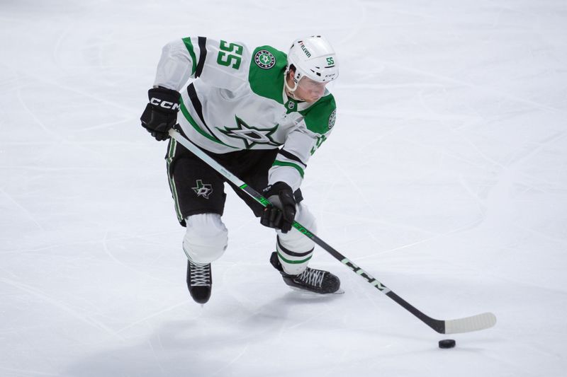 Feb 22, 2024; Ottawa, Ontario, CAN; Dallas Stars defenseman Thomas Harley (55) skates with the puck in the third period against the Ottawa Senators at the Canadian Tire Centre. Mandatory Credit: Marc DesRosiers-USA TODAY Sports