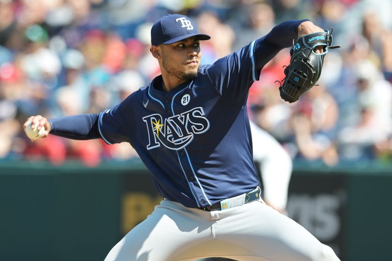 Sep 15, 2024; Cleveland, Ohio, USA; Tampa Bay Rays starting pitcher Taj Bradley (45) throws a pitch during the first inning against the Cleveland Guardians at Progressive Field. Mandatory Credit: Ken Blaze-Imagn Images