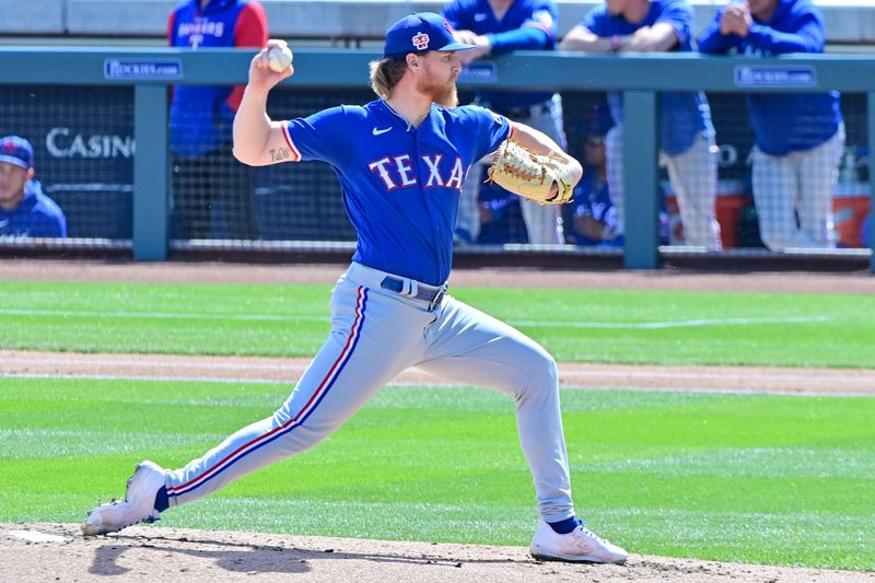 Mar 8, 2023; Salt River Pima-Maricopa, Arizona, USA; Texas Rangers starting pitcher Jon Gray (22) throws in the second inning against the Arizona Diamondbacks during a Spring Training game at Salt River Fields at Talking Stick. Mandatory Credit: Matt Kartozian-USA TODAY Sports