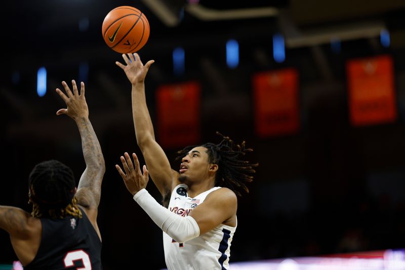 Mar 4, 2023; Charlottesville, Virginia, USA; Virginia Cavaliers guard Armaan Franklin (4) shoots the ball over Louisville Cardinals guard El Ellis (3) in the second half at John Paul Jones Arena. Mandatory Credit: Geoff Burke-USA TODAY Sports