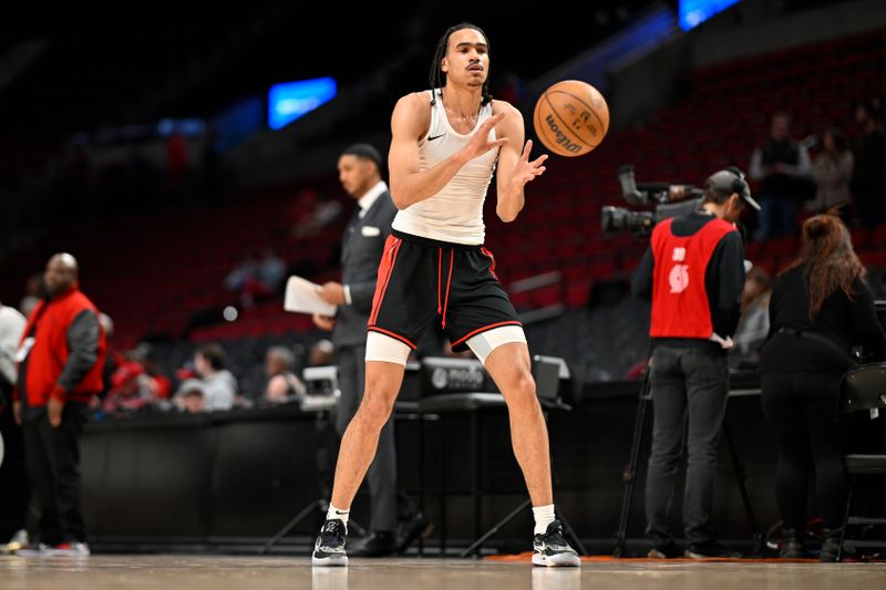 PORTLAND, OREGON - MARCH 08: Dalano Banton #5 of the Portland Trail Blazers warms up before the game against the Houston Rockets at the Moda Center on March 08, 2024 in Portland, Oregon. NOTE TO USER: User expressly acknowledges and agrees that, by downloading and or using this photograph, User is consenting to the terms and conditions of the Getty Images License Agreement. (Photo by Alika Jenner/Getty Images)