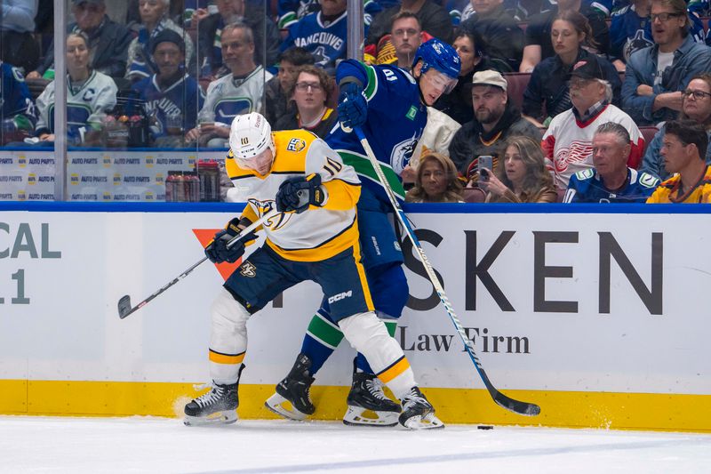 Apr 21, 2024; Vancouver, British Columbia, CAN; Nashville Predators forward Colton Sissons (10) checks Vancouver Canucks defenseman Nikita Zadorov (91) in the first period in game one of the first round of the 2024 Stanley Cup Playoffs at Rogers Arena. Mandatory Credit: Bob Frid-USA TODAY Sports