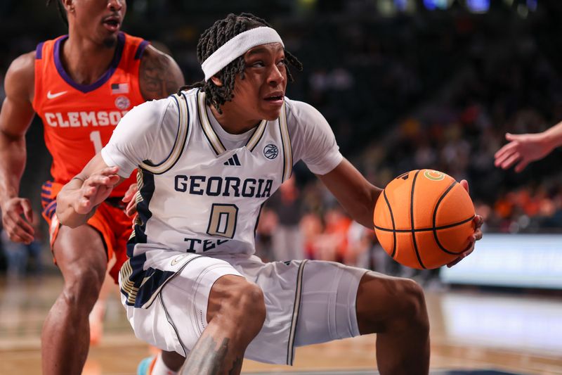 Jan 24, 2026; Atlanta, Georgia, USA; Georgia Tech Yellow Jackets guard Akai Fleming (0) drives to the basket against the Clemson Tigers in the second half at McCamish Pavilion. Mandatory Credit: Brett Davis-Imagn Images