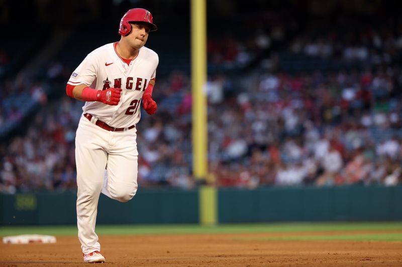 Sep 9, 2023; Anaheim, California, USA;  Los Angeles Angels designated hitter Matt Thaiss (21) hits a home run during the fourth inning against the Cleveland Guardians at Angel Stadium. Mandatory Credit: Kiyoshi Mio-USA TODAY Sports