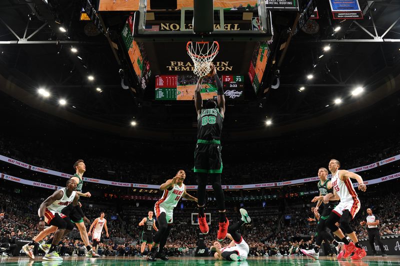 BOSTON, MA - DECEMBER 2: Neemias Queta #88 of the Boston Celtics dunks the ball during the game against the Miami Heat on December 2, 2024 at TD Garden in Boston, Massachusetts. NOTE TO USER: User expressly acknowledges and agrees that, by downloading and/or using this Photograph, user is consenting to the terms and conditions of the Getty Images License Agreement. Mandatory Copyright Notice: Copyright 2024 NBAE (Photo by Brian Babineau/NBAE via Getty Images)