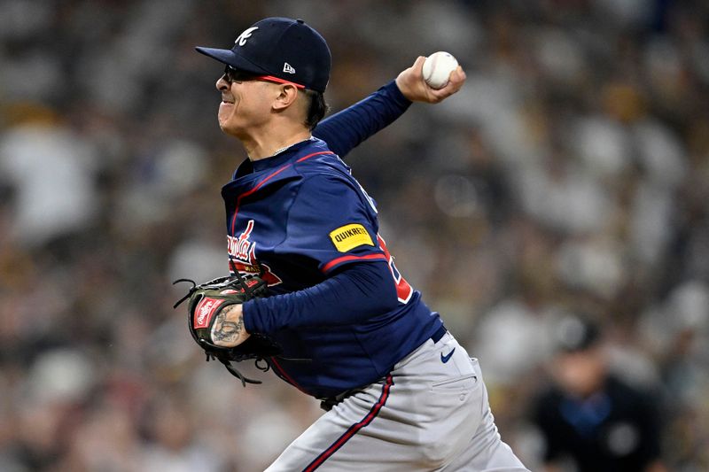 Oct 1, 2024; San Diego, California, USA; Atlanta Braves pitcher Jesse Chavez (60) throws a pitch against the San Diego Padres during the fifth inning in game one of the Wildcard round for the 2024 MLB Playoffs at Petco Park. Mandatory Credit: Denis Poroy-Imagn Images