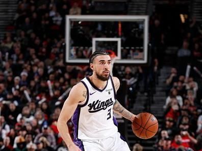 PORTLAND, OR - DECEMBER 26: Chris Duarte #3 of the Sacramento Kings dribbles the ball during the game against the Portland Trail Blazers on December 26, 2023 at the Moda Center Arena in Portland, Oregon. NOTE TO USER: User expressly acknowledges and agrees that, by downloading and or using this photograph, user is consenting to the terms and conditions of the Getty Images License Agreement. Mandatory Copyright Notice: Copyright 2023 NBAE (Photo by Cameron Browne/NBAE via Getty Images)