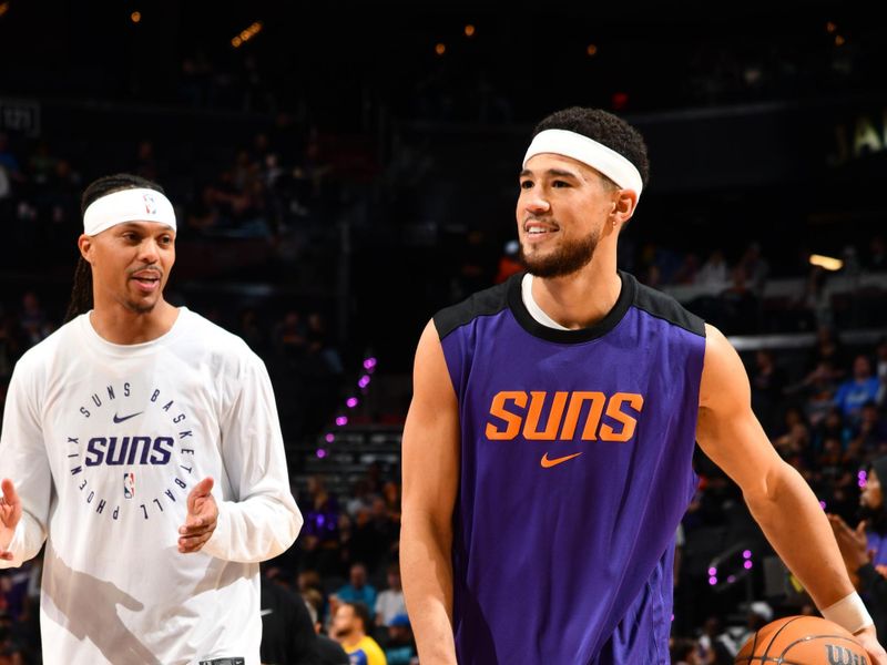 PHOENIX, AZ - NOVEMBER 30: Devin Booker #1 of the Phoenix Suns warms up before the game against the Golden State Warriors on November 30, 2024 at Footprint Center in Phoenix, Arizona. NOTE TO USER: User expressly acknowledges and agrees that, by downloading and or using this photograph, user is consenting to the terms and conditions of the Getty Images License Agreement. Mandatory Copyright Notice: Copyright 2024 NBAE (Photo by Barry Gossage/NBAE via Getty Images)