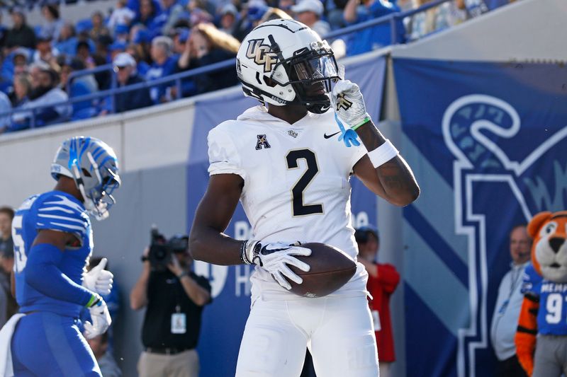 Nov 5, 2022; Memphis, Tennessee, USA; UCF Knights wide receiver Kobe Hudson (2) reacts after a touchdown catch during the first half against the Memphis Tigers  at Liberty Bowl Memorial Stadium. Mandatory Credit: Petre Thomas-USA TODAY Sports