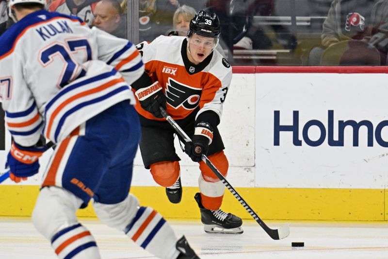 Nov 12, 2025; Philadelphia, Pennsylvania, USA; Philadelphia Flyers right wing Matvei Michkov (39) skates with the puck against the Edmonton Oilers during the first period at Xfinity Mobile Arena. Mandatory Credit: Eric Hartline-Imagn Images