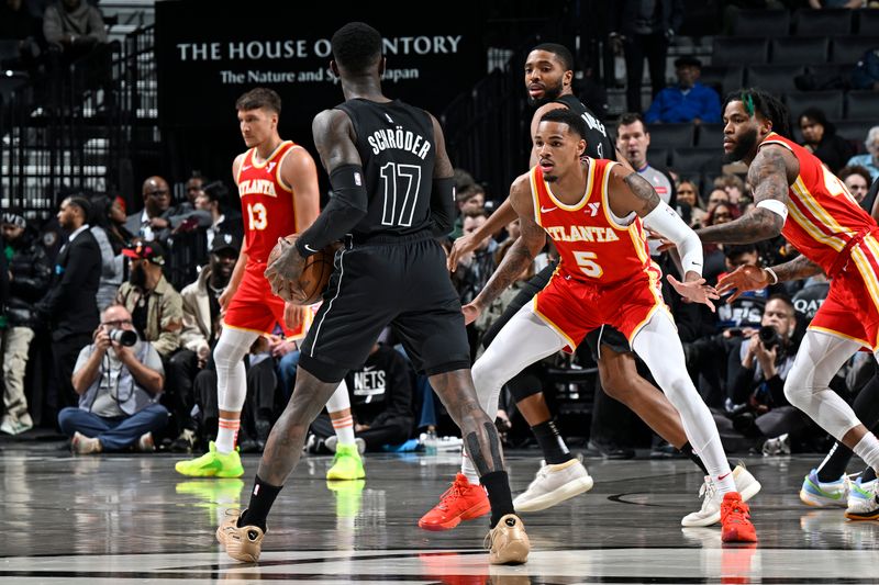 BROOKLYN, NY - FEBRUARY 29: Dejounte Murray #5 of the Atlanta Hawks plays defense during the game against the Brooklyn Nets on February 29, 2024 at Barclays Center in Brooklyn, New York. NOTE TO USER: User expressly acknowledges and agrees that, by downloading and or using this Photograph, user is consenting to the terms and conditions of the Getty Images License Agreement. Mandatory Copyright Notice: Copyright 2024 NBAE (Photo by David Dow/NBAE via Getty Images)