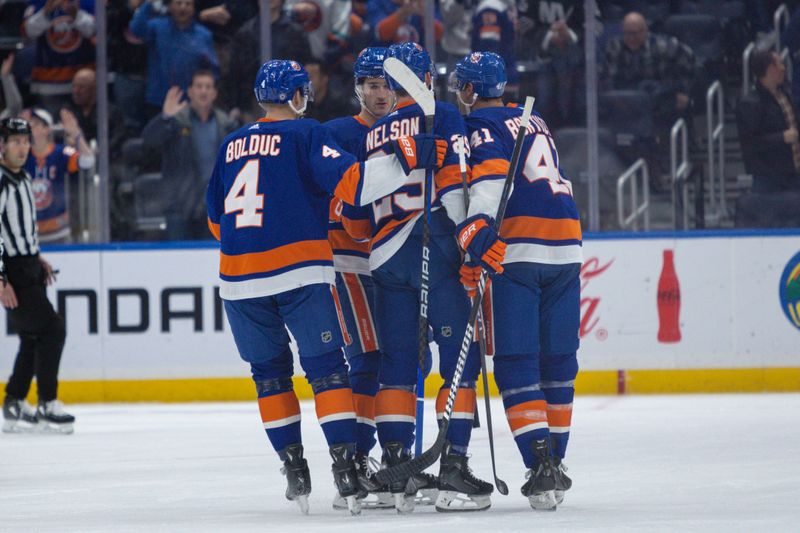 Dec 11, 2023; Elmont, New York, USA; New York Islanders center Brock Nelson (29) celebrates his goal against the Toronto Maple Leafs during the first period at UBS Arena. Mandatory Credit: Thomas Salus-USA TODAY Sports