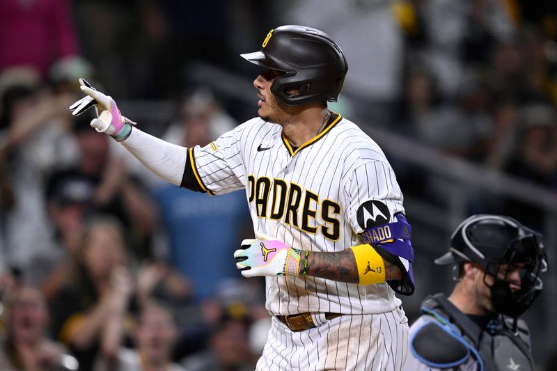 Aug 21, 2023; San Diego, California, USA; San Diego Padres third baseman Manny Machado (13) celebrates after hitting a home run against the Miami Marlins during the fifth inning at Petco Park. Mandatory Credit: Orlando Ramirez-USA TODAY Sports