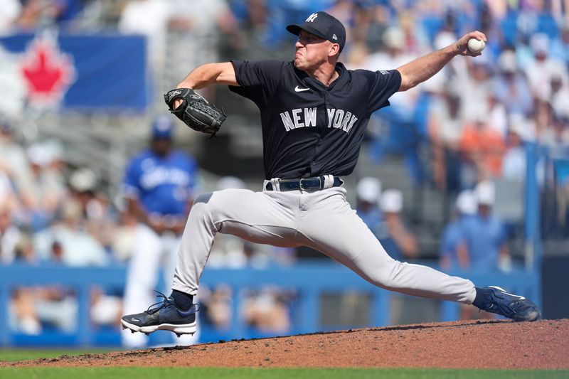 Mar 8, 2024; Dunedin, Florida, USA;  New York Yankees pitcher Geoffrey Gilbert (18) throws a pitch against the Toronto Blue Jays in the sixth inning at TD Ballpark. Mandatory Credit: Nathan Ray Seebeck-USA TODAY Sports