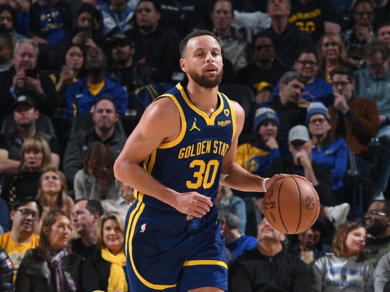 SAN FRANCISCO, CA - FEBRUARY 22:  Stephen Curry #30 of the Golden State Warriors handles the ball during the game  on February 22, 2024 at Chase Center in San Francisco, California. NOTE TO USER: User expressly acknowledges and agrees that, by downloading and or using this photograph, user is consenting to the terms and conditions of Getty Images License Agreement. Mandatory Copyright Notice: Copyright 2024 NBAE (Photo by Noah Graham/NBAE via Getty Images)