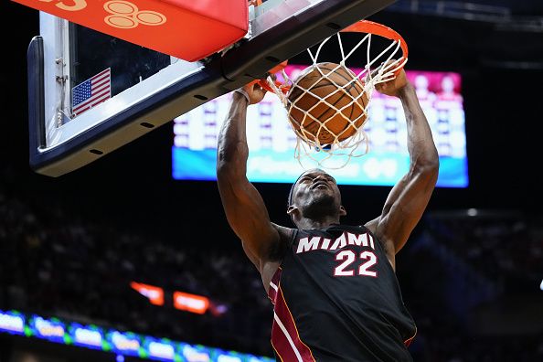 MIAMI, FLORIDA - DECEMBER 08: Jimmy Butler #22 of the Miami Heat dunks the ball against the Cleveland Cavaliers during the fourth quarter at Kaseya Center on December 08, 2023 in Miami, Florida. NOTE TO USER: User expressly acknowledges and agrees that, by downloading and or using this photograph, User is consenting to the terms and condtions of the Getty Images License Agreement.  (Photo by Rich Storry/Getty Images)