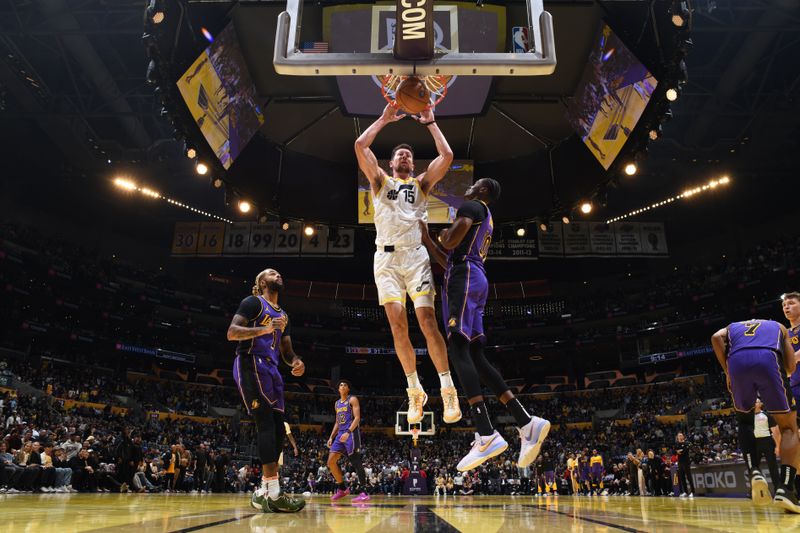 LOS ANGELES, CA - NOVEMBER 19: Drew Eubanks #15 of the Utah Jazz dunks the ball during the game against the Los Angeles Lakers during the Emirates NBA Cup game on November 19, 2024 at Crypto.Com Arena in Los Angeles, California. NOTE TO USER: User expressly acknowledges and agrees that, by downloading and/or using this Photograph, user is consenting to the terms and conditions of the Getty Images License Agreement. Mandatory Copyright Notice: Copyright 2024 NBAE (Photo by Adam Pantozzi/NBAE via Getty Images)