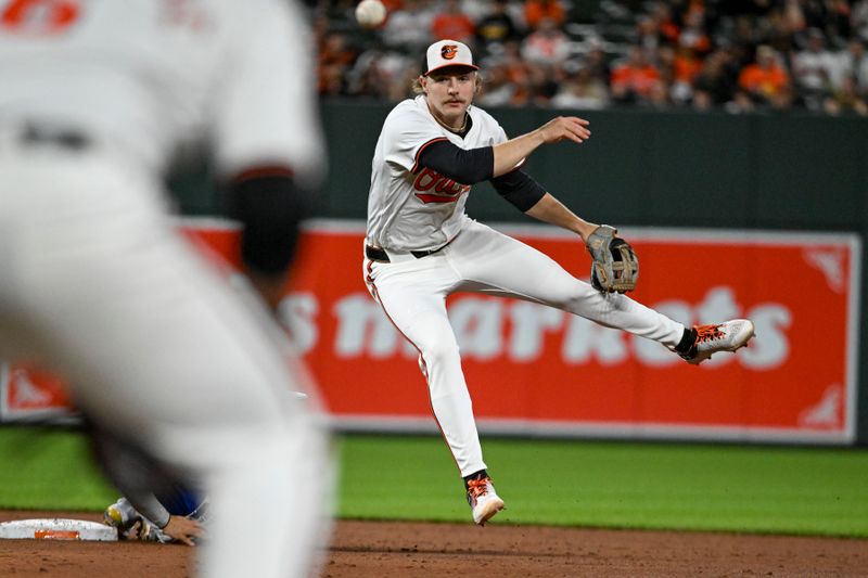 May 13, 2024; Baltimore, Maryland, USA; Baltimore Orioles shortstop Gunnar Henderson (2) throws to first base on a eighth inning ending double play against the Toronto Blue Jays  at Oriole Park at Camden Yards. Mandatory Credit: Tommy Gilligan-USA TODAY Sports