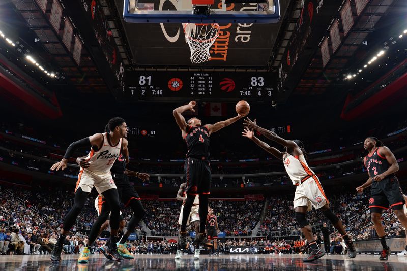 DETROIT, MI - NOVEMBER 24: Scottie Barnes #4 of the Toronto Raptors rebounds the ball during the game against the Detroit Pistons on November 24, 2024 at Little Caesars Arena in Detroit, Michigan. NOTE TO USER: User expressly acknowledges and agrees that, by downloading and/or using this photograph, User is consenting to the terms and conditions of the Getty Images License Agreement. Mandatory Copyright Notice: Copyright 2024 NBAE (Photo by Chris Schwegler/NBAE via Getty Images)