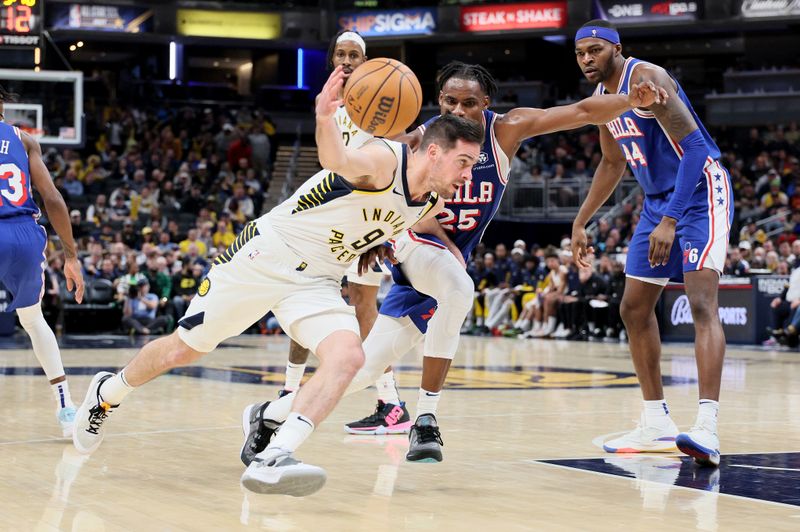 INDIANAPOLIS, INDIANA - JANUARY 25: T.J. McConnell #9 of the Indiana Pacers dribbles the ball against the Philadelphia 76ers during the second half of the game at Gainbridge Fieldhouse on January 25, 2024 in Indianapolis, Indiana.    NOTE TO USER: User expressly acknowledges and agrees that, by downloading and or using this photograph, User is consenting to the terms and conditions of the Getty Images License Agreement.  (Photo by Andy Lyons/Getty Images)