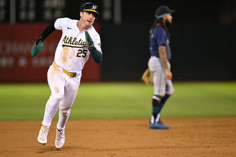 Sep 4, 2024; Oakland, California, USA; Oakland Athletics designated hitter Brent Rooker (25) runs the bases against the Seattle Mariners in the sixth inning at Oakland-Alameda County Coliseum. Mandatory Credit: Eakin Howard-Imagn Images