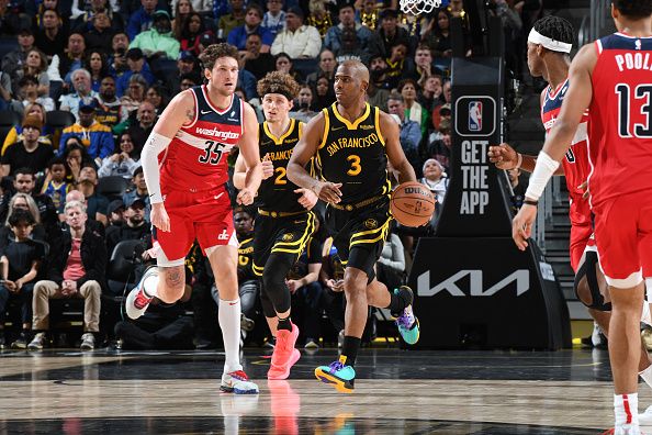 SAN FRANCISCO, CA - DECEMBER 22: Chris Paul #3 of the Golden State Warriors brings the ball up court against the Washington Wizards on December 22, 2023 at Chase Center in San Francisco, California. NOTE TO USER: User expressly acknowledges and agrees that, by downloading and or using this photograph, user is consenting to the terms and conditions of Getty Images License Agreement. Mandatory Copyright Notice: Copyright 2023 NBAE (Photo by Noah Graham/NBAE via Getty Images)