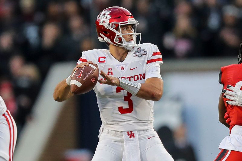 Dec 4, 2021; Cincinnati, Ohio, USA; Houston Cougars quarterback Clayton Tune (3) throws a pass against the Cincinnati Bearcats in the first half during the American Athletic Conference championship game at Nippert Stadium. Mandatory Credit: Katie Stratman-USA TODAY Sports