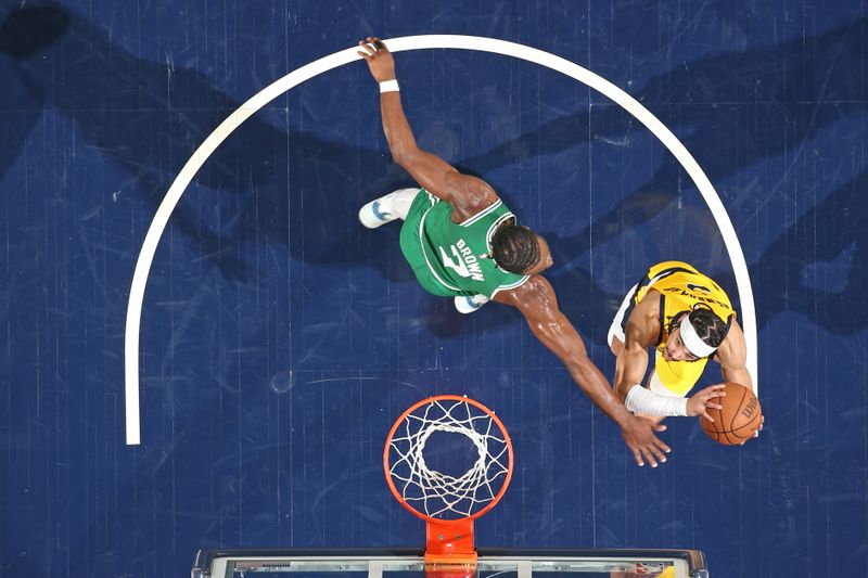INDIANAPOLIS, IN - MAY 27: Andrew Nembhard #2 of the Indiana Pacers drives to the basket during the game against the Boston Celtics during Game 4 of the Eastern Conference Finals of the 2024 NBA Playoffs on May 27, 2024 at Gainbridge Fieldhouse in Indianapolis, Indiana. NOTE TO USER: User expressly acknowledges and agrees that, by downloading and or using this Photograph, user is consenting to the terms and conditions of the Getty Images License Agreement. Mandatory Copyright Notice: Copyright 2024 NBAE (Photo by Nathaniel S. Butler/NBAE via Getty Images)