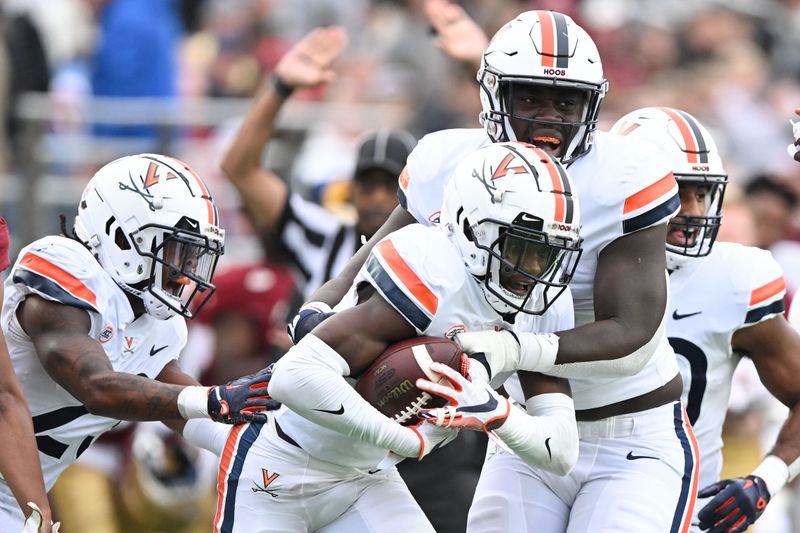 Sep 30, 2023; Chestnut Hill, Massachusetts, USA; Virginia Cavaliers cornerback Dre Walker (6) reacts after making an interception against the Boston College Eagles during the first half at Alumni Stadium. Mandatory Credit: Brian Fluharty-USA TODAY Sports