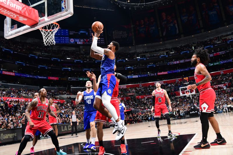 LOS ANGELES, CA - MARCH 9: Paul George #13 of the LA Clippers shoots the ball during the game against the Chicago Bulls on March 9, 2024 at Crypto.Com Arena in Los Angeles, California. NOTE TO USER: User expressly acknowledges and agrees that, by downloading and/or using this Photograph, user is consenting to the terms and conditions of the Getty Images License Agreement. Mandatory Copyright Notice: Copyright 2024 NBAE (Photo by Adam Pantozzi/NBAE via Getty Images)